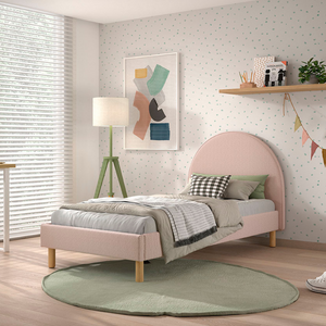 The Moon Kids Bed 90 x 200cm in Pink Boucle features a rounded headboard, soft upholstery and durable frame that is both cozy and stylish for any child