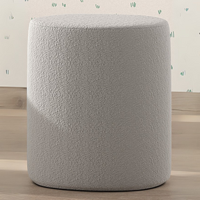 The Moon Kids Stool in Boucle is available in pink, white, grey and olive green, soft upholstery, multifunctional design and Belgian style