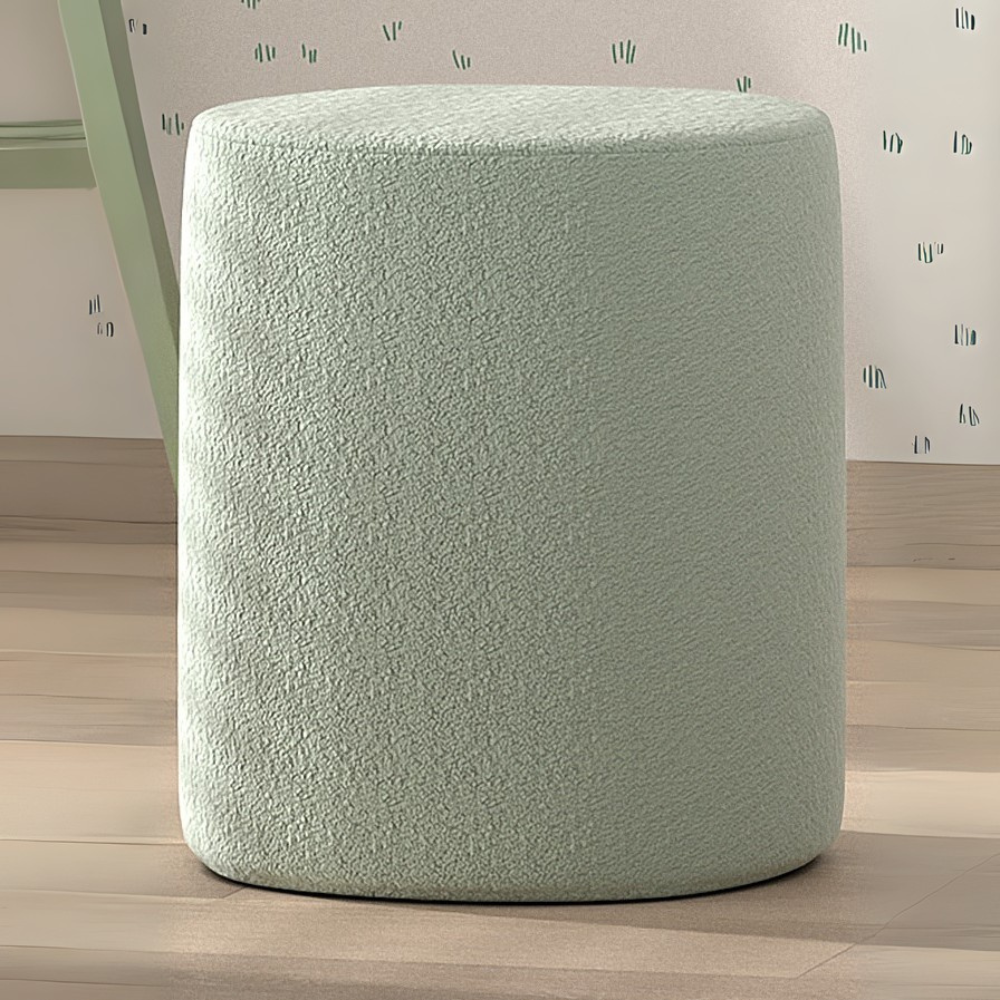 The Moon Kids Stool in Boucle is available in pink, white, grey and olive green, soft upholstery, multifunctional design and Belgian style