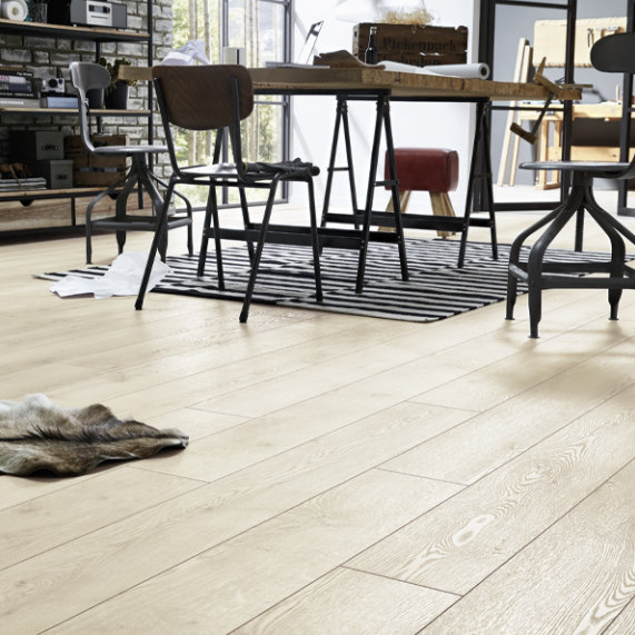 The Mountain Oak Beige Laminate Flooring - 12mm features long planks, AC5 durability, and 5G click installation system.