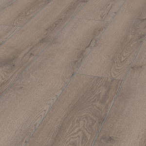 The Mountain Oak Grey Laminate Flooring 12mm features AC5 rated, long planks for a chic look and 5G installation compatible with underfloor heating.