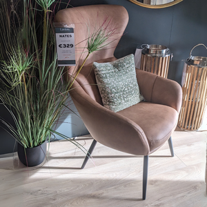 The Nates Accent Chair in Tan features durable fabric, sink in comfort and a compact stylish design, a versatile piece to elevate any modern living space