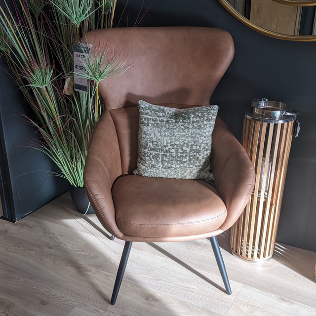 The Nates Accent Chair in Tan features durable fabric, sink in comfort and a compact stylish design, a versatile piece to elevate any modern living space