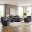 Dark grey 3+1+1 recliner sofa set in a living room with large windows and decor.