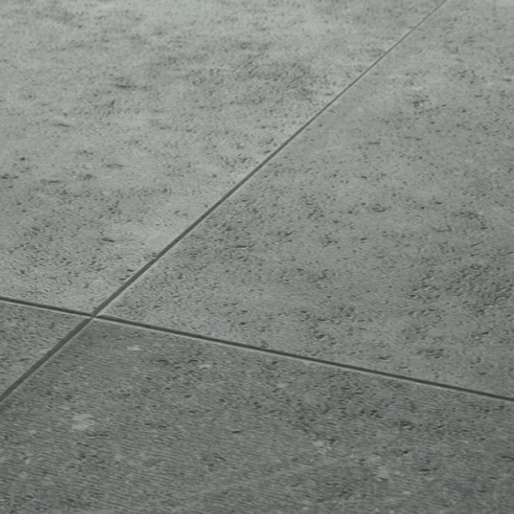 The Ninaventura Graphite Tile SPC Flooring features sleek tile design, waterproof mineral core, Titanium Nano finish and 25 year warranty