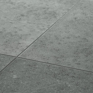 The Ninaventura Graphite Tile SPC Flooring features sleek tile design, waterproof mineral core, Titanium Nano finish and 25 year warranty
