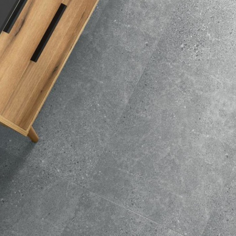 The Ninaventura Silver Forma Tile SPC Flooring features sleek tile design, waterproof mineral core, Titanium Nano finish and 25 year warranty