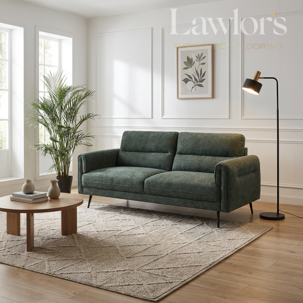 Green 2 seater sofa in a living room