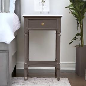 With its marble top, storage drawer, and lower shelf, the Olive Brown 1 Drawer Side Table adds flair and functionality to any area.