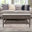 The Olive Brown2 Drawer Coffee Table has 2 drawers, a lower shelf, and a marble top