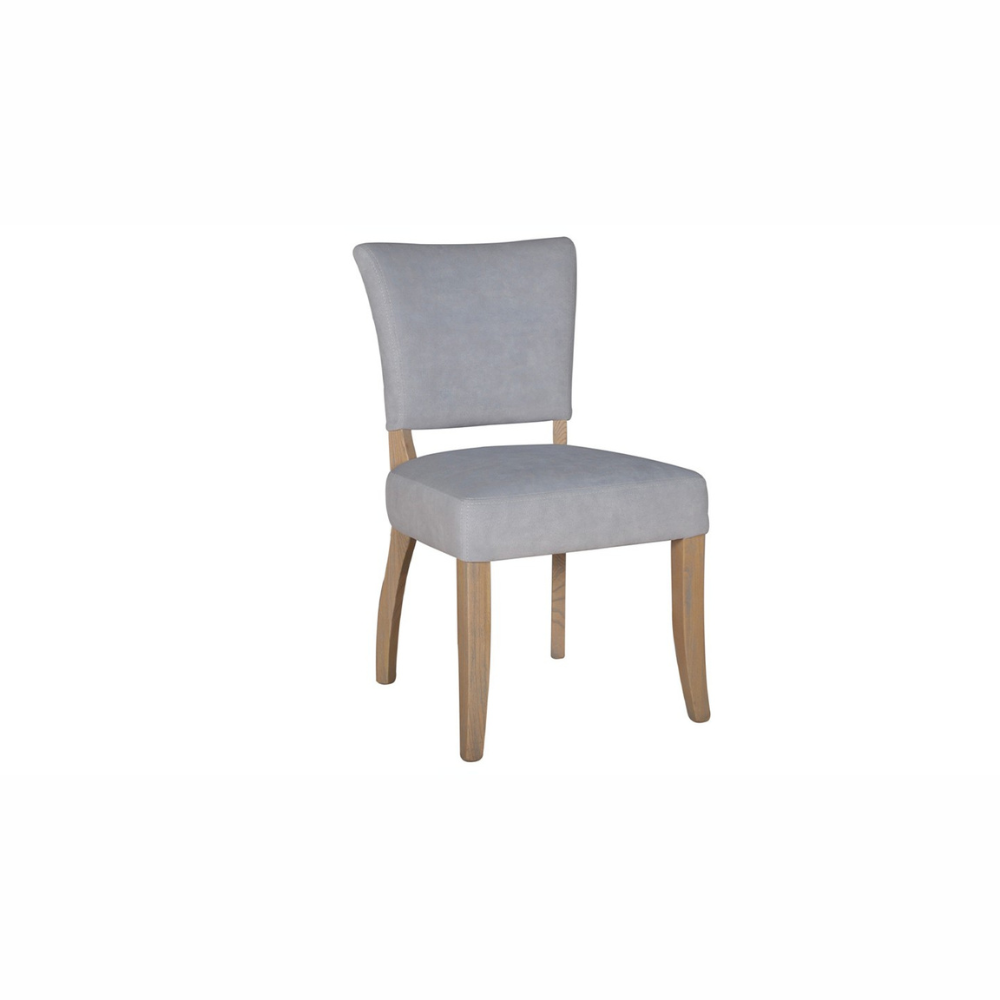 The Ontario Leather & Velvet Dining Chair offers the Ink Blue and Tan in leather and Grey, Dark Grey and Blue in velvet with a solid oak frame and legs