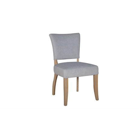 The Ontario Leather & Velvet Dining Chair offers the Ink Blue and Tan in leather and Grey, Dark Grey and Blue in velvet with a solid oak frame and legs