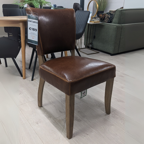 The Ontario Leather & Velvet Dining Chair offers the Ink Blue and Tan in leather and Grey, Dark Grey and Blue in velvet with a solid oak frame and legs