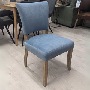 The Ontario Leather & Velvet Dining Chair offers the Ink Blue and Tan in leather and Grey, Dark Grey and Blue in velvet with a solid oak frame and legs