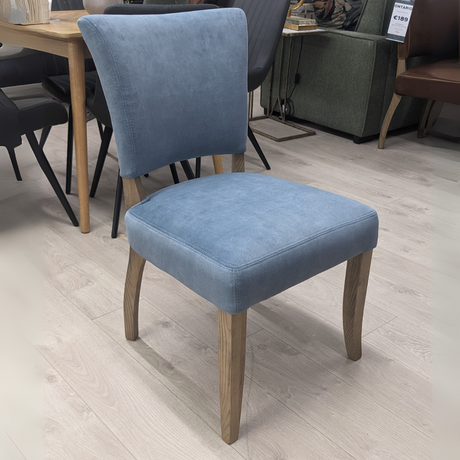 The Ontario Leather & Velvet Dining Chair offers the Ink Blue and Tan in leather and Grey, Dark Grey and Blue in velvet with a solid oak frame and legs