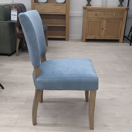 The Ontario Leather & Velvet Dining Chair offers the Ink Blue and Tan in leather and Grey, Dark Grey and Blue in velvet with a solid oak frame and legs