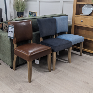 The Ontario Leather & Velvet Dining Chair offers the Ink Blue and Tan in leather and Grey, Dark Grey and Blue in velvet with a solid oak frame and legs