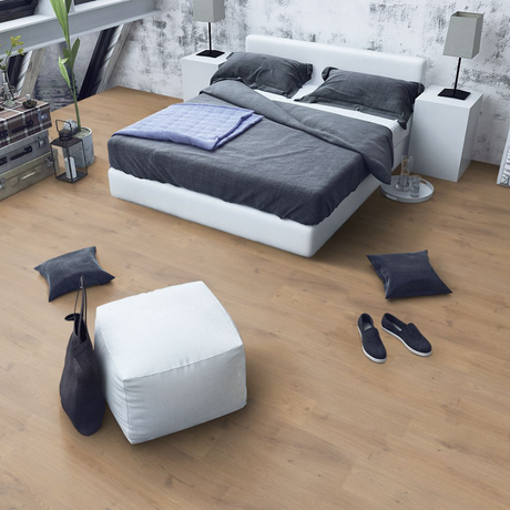 The Oregon Oak Laminate Flooring - 12mm features rich honey tones, AC4 durability, embossed texture, V Groove Bevel and easy DocLoc installation