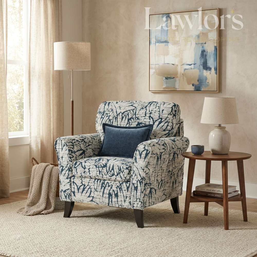 Patterned navy accent armchair in a living room