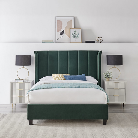 The Palmer Bed in Emerald Green in 4ft6 Double and 5ft King features a 134cm headboard, recycled velvet and winged design, where eco-friendly meets luxury