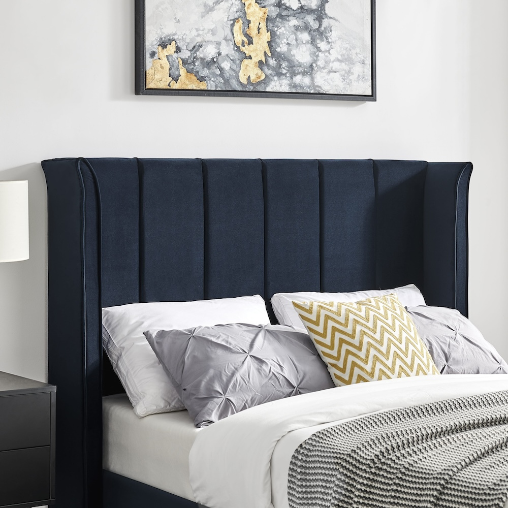 The Palmer Bed in Navy comes in 4ft6 Double and 5ft King featuring a 134cm headboard, recycled velvet and winged design, where eco-friendly meets luxury