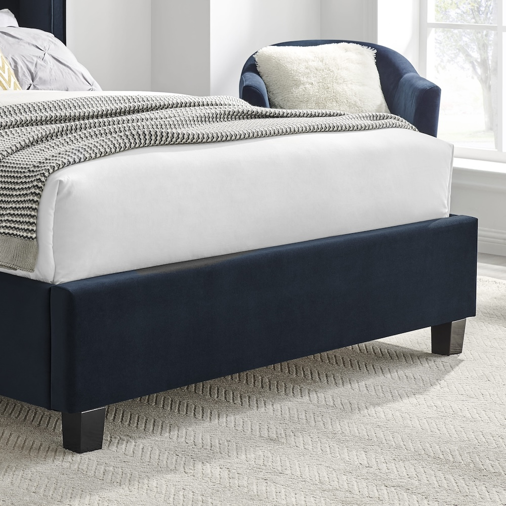 The Palmer Bed in Navy comes in 4ft6 Double and 5ft King featuring a 134cm headboard, recycled velvet and winged design, where eco-friendly meets luxury