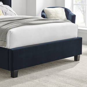 The Palmer Bed in Navy comes in 4ft6 Double and 5ft King featuring a 134cm headboard, recycled velvet and winged design, where eco-friendly meets luxury
