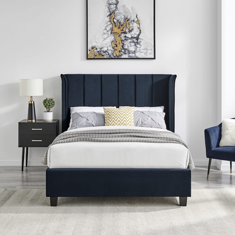 The Palmer Bed in Navy comes in 4ft6 Double and 5ft King featuring a 134cm headboard, recycled velvet and winged design, where eco-friendly meets luxury