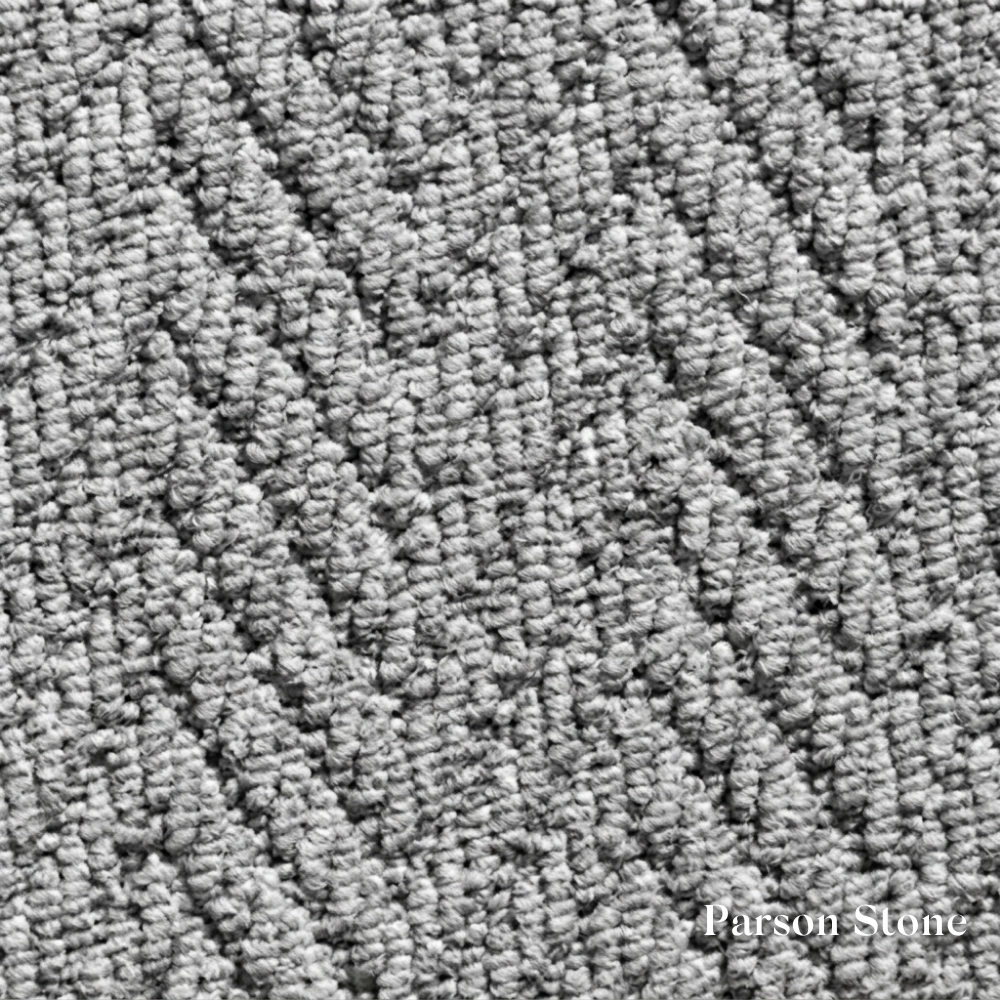 Close-up of textured gray carpet with 'Parson Stone' branding.