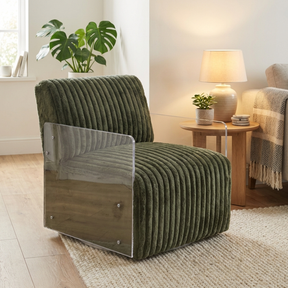 The Paxton Velvet Swivel Chair in Green & White features soft velvet, clear armrests and 360° swivel design for a modern, luxurious seating experience