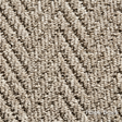 Close-up of textured beige carpet with 'Pebble Beach' label
