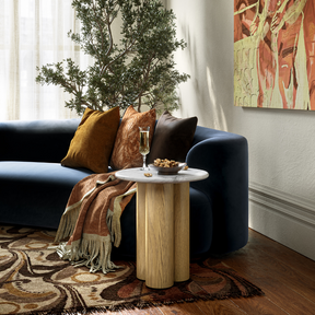 The Phoenix 3 Column Side Table features solid column legs and marble top, making this a stylish and versatile addition to any living space