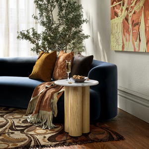 The Phoenix 3 Column Side Table features solid column legs and marble top, making this a stylish and versatile addition to any living space