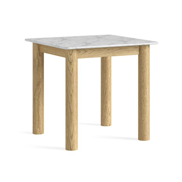 The Phoenix Bistro Table in oak with a marble top blends modern style and practicality, perfect for kitchens, breakfast areas or compact dining spaces