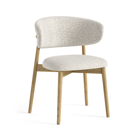 The Phoenix Boucle Dining Chair in White & Grey features soft boucle, curved design & light oak frame to combine comfort, elegance & timeless craftsmanship