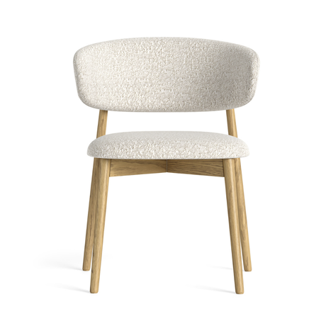 The Phoenix Boucle Dining Chair in White & Grey features soft boucle, curved design & light oak frame to combine comfort, elegance & timeless craftsmanship