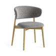 The Phoenix Boucle Dining Chair in White & Grey features soft boucle, curved design & light oak frame to combine comfort, elegance & timeless craftsmanship