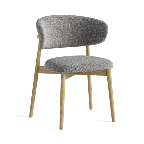 The Phoenix Boucle Dining Chair in White & Grey features soft boucle, curved design & light oak frame to combine comfort, elegance & timeless craftsmanship