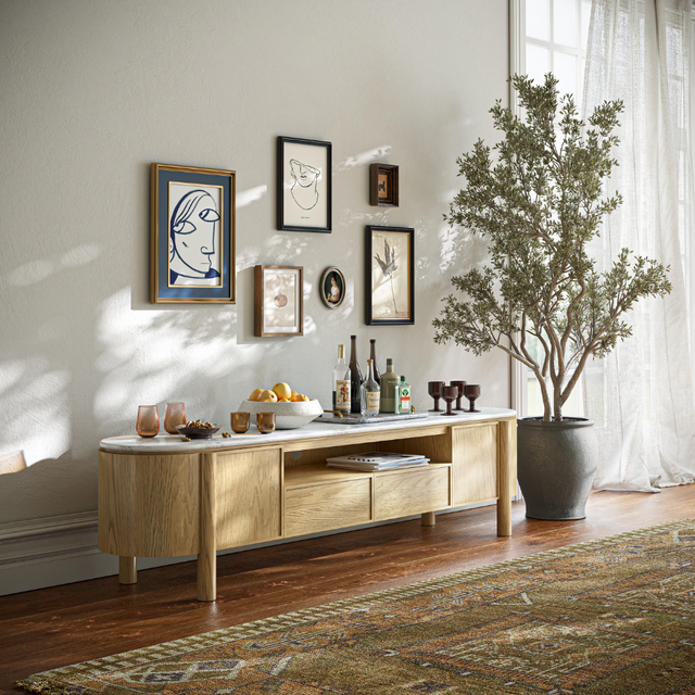 The Phoenix Large TV Unit features a marble top, shelves and side cabinets along with an oak finish for an elegant design with smart storage spaces