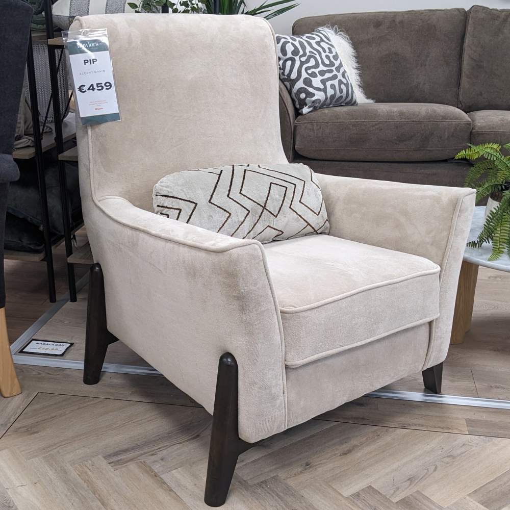 Discover the Pip Accent Chair in Cream, a stylish, comfortable and durable piece that adds modern elegance to any living space