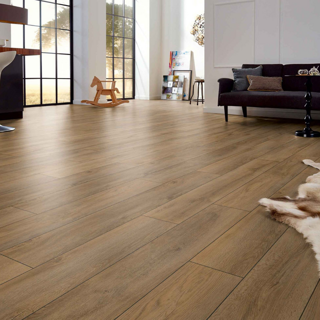 The Premium Oak Brown Laminate Flooring - 12mm, AC5-rated, rich brown oak finish, durable and easy 5G Click install.