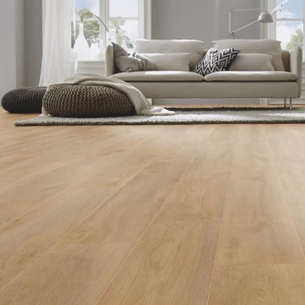 The Premium Oak Natural Laminate Flooring - 12mm features Durable AC5-rated, 4V bevelled edges and easy-to-install Clic system.