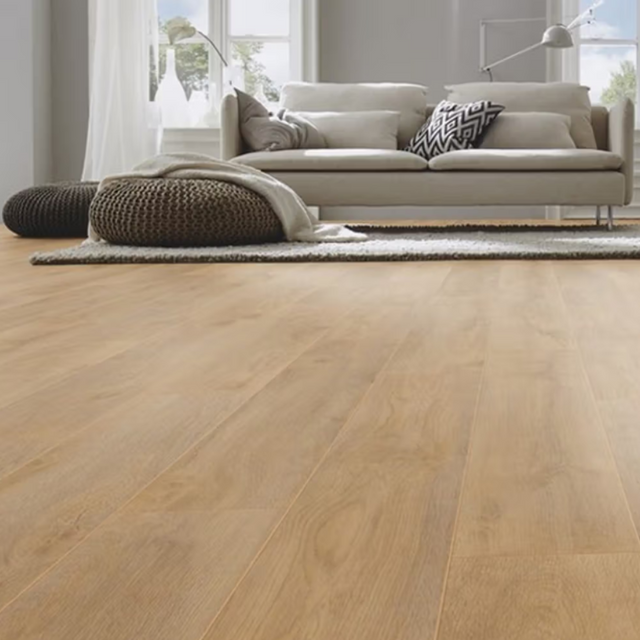The Premium Oak Natural Laminate Flooring - 12mm features Durable AC5-rated, 4V bevelled edges and easy-to-install Clic system.