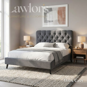 Prescott Bedframe in Dark Grey with plush buttoned headboard, soft fabric base and dark wooden legs.
