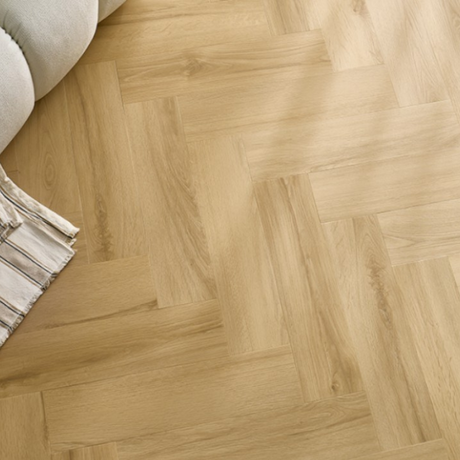 The Princeton Oak Herringbone SPC Flooring features a timeless oak design, suitable for underfloor heating, Titanium Nano finish and a 25 year warranty