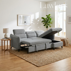 Grey sectional RHF sofa bed with storage drawers in a living room setting