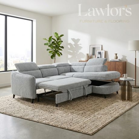 Grey sectional RHF corner sofa bed in a living room