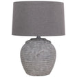 The Rosso Small Stone Table Lamp is crafted with quality and elegance in mind, featuring a stone base and minimalist design