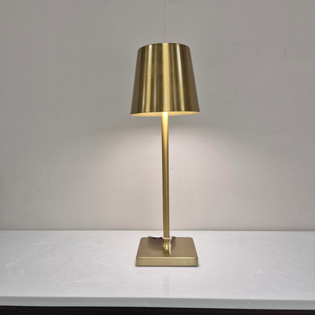 The stylish Rechargeable LED Table Lamp in Gold features 3 light tones, a built in USB port for convenient charging & a compact 33cm design