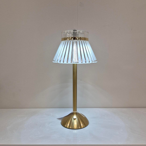 The Rechargeable LED Table Lamp 33cm in Gold base & Crystal shade features 3 light tones, a built in USB port & a compact 33cm design for any modern space